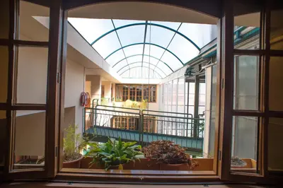 a view of a building with a glass ceiling at Hotel Prisma Cusco in Cusco