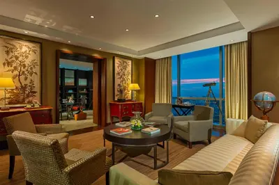 a living room with a couch and a table at The Westin Lima Hotel & Convention Center in Lima