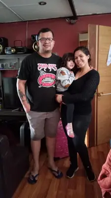 a man and woman posing for a picture with a baby at Casa Salkantay Cusco in Cusco