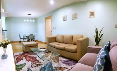 a living room with a couch and a table at GL Apts, rent Upper Pardo Miraflores - Suite 1 Hab in Lima