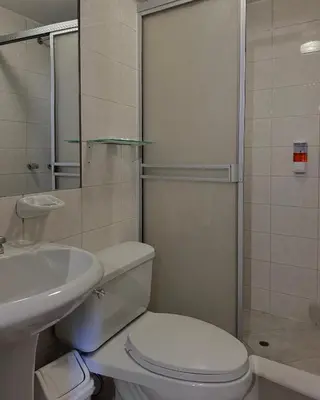 a bathroom with a toilet and a sink and a shower at Huascaran Casa Boutique San Blas in Cusco