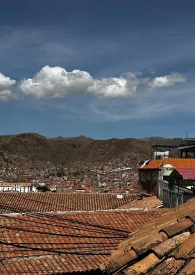 a view of a city from the roofs of buildings at Huascaran Casa Boutique San Blas in Cusco
