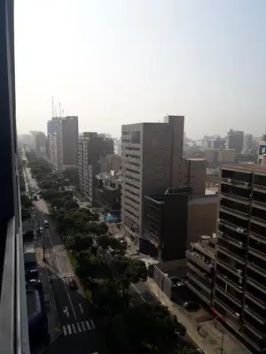 a view of a city with tall buildings and a street at Miraflores Heart Apartment in Lima