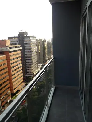 a balcony with a view of a city at Miraflores Heart Apartment in Lima
