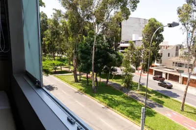 a view from a window of a street at Palmetto Hotel Business San Borja in Lima