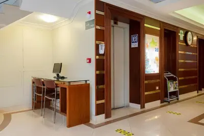 an office with a desk and a computer in a room at Hotel María Luisa in Lima