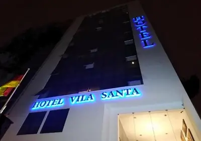 a building with a hotel villa santana sign on it at Hotel Vila Santa in Lima