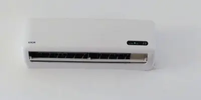 a white air conditioner on a white wall at Casa Hacienda Nasca Oasis in Nazca