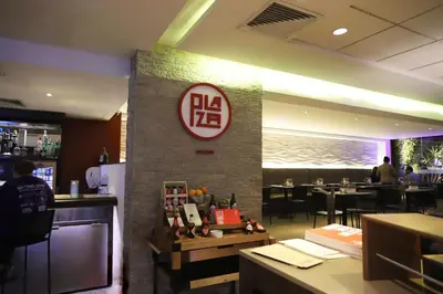 a restaurant with a big sign on the wall at Casa Andina Select Miraflores in Lima