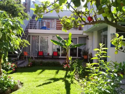 a view of a house from the garden at Casa Samaykuy in Ayacucho