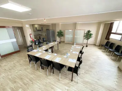 a conference room with a long table and chairs at Gran Caral Hotel in Barranca