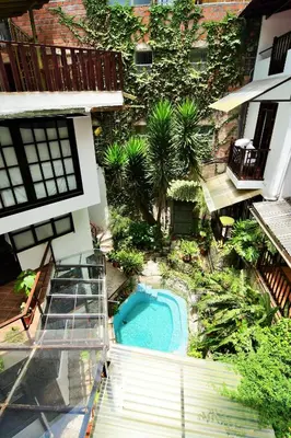 an overhead view of a building with a swimming pool at Gringo Bill's Boutique Hotel in Machu Picchu