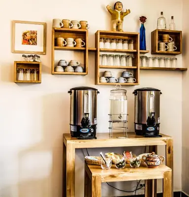 a kitchen with two blenders on a shelf at Tariq Boutique in Cusco