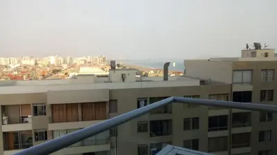 a view of the city from the balcony of a building at Lima Flats in Lima