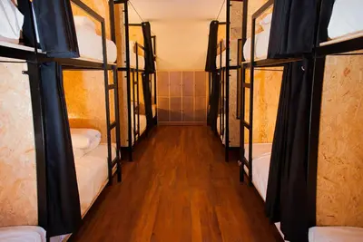a group of bunk beds in a room at Xplora Hostel Cusco in Cusco