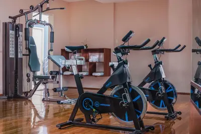 a gym with two exercise bikes in a room at Nobility Grand Hotel in Lima