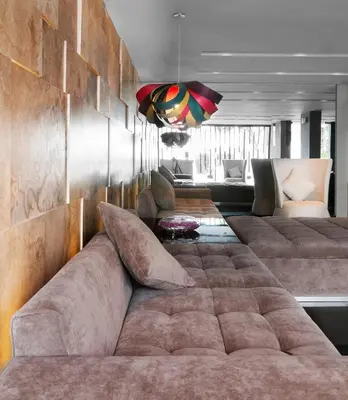 a living room with couches and a couch at Arawi Miraflores Prime in Lima