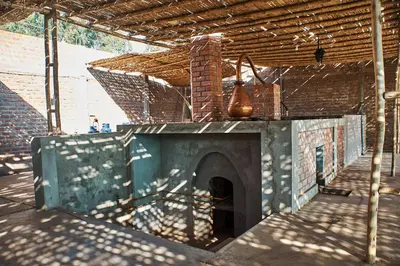 a brick oven in a building with a roof at Hotel Majoro in Nazca