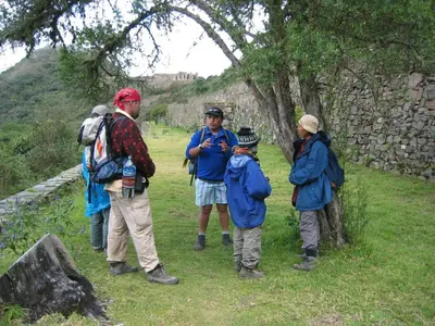 a group of people standing on top of a hill at Maison Fortaleza in Cusco