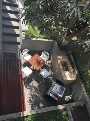 an overhead view of a patio with a table and chairs at Zen Home & Garden House in Cieneguilla