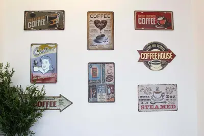 a wall with a bunch of signs on a wall at Tierra Viva Miraflores Centro in Lima