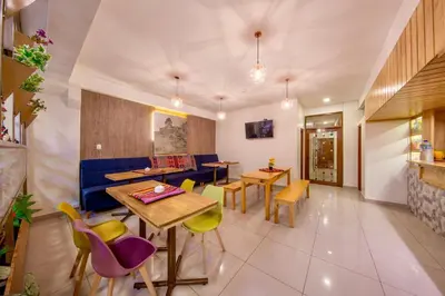 a restaurant with tables and chairs in a room at Casa Matara Boutique in Cusco