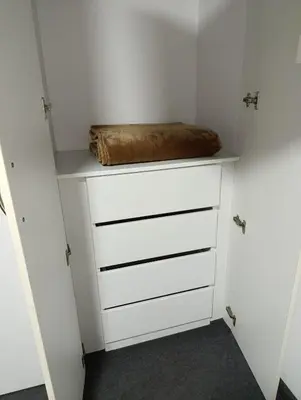 a closet with a dresser with a bag on it at MIRAFLORES APART-10Beds-11Persons-Pool-Grill-Garage-Near Kennedy Park in Lima