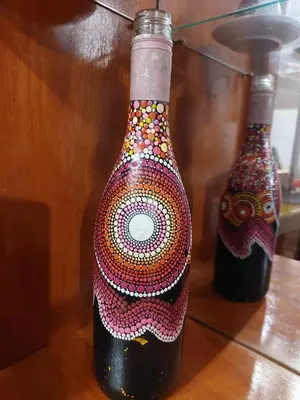two bottles of wine sitting on top of a table at Mandalas Cusco in Cusco