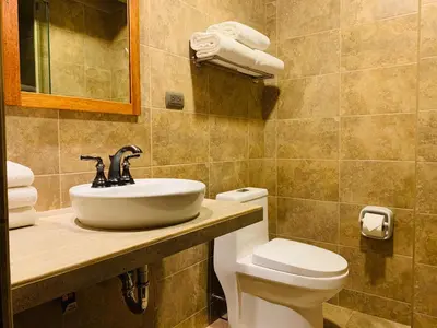 a bathroom with a sink and a toilet at 1911 in Machu Picchu