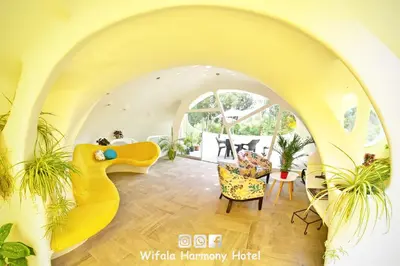 a living room with a yellow rubber duck in the middle at Wifala Harmony Hotel in Urubamba