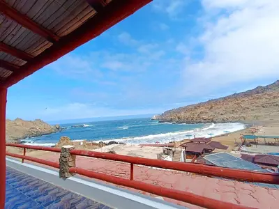 a view of the beach from a balcony at Hotel Puerto Inka in Chala