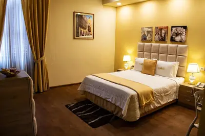 a hotel room with a bed and a window at Hotel Inka Path in Lima