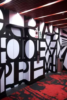 a room with black and white walls and a red carpet at Radisson RED Miraflores in Lima