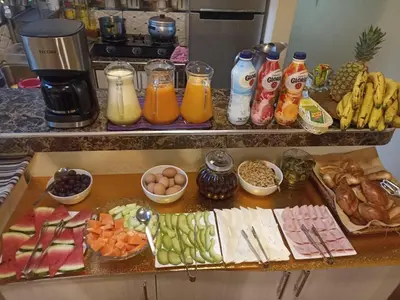 a counter with a bunch of different types of food at Hs Tierra In in Machu Picchu