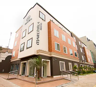 a building with a sign on the side of it at Martinika in Lima