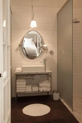 a bathroom with a sink and a mirror at Hotel B in Lima