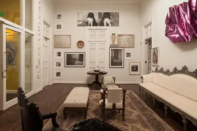 a living room with a couch and a table at Hotel B in Lima
