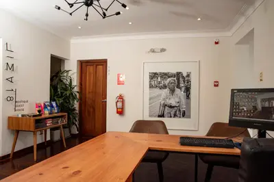 an office with a desk with a computer on it at Lima 18 Boutique in Lima