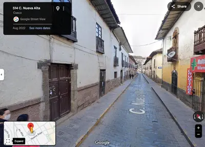 an empty street in an alley with buildings at Nice studio in historic center with private bathroom and kitchen! in Cusco