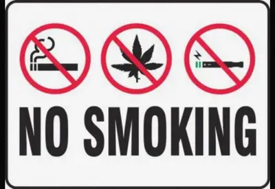 a sign that says no smoking and no smokinghazard at Arena Costa Lima private rooms Peru in Lima