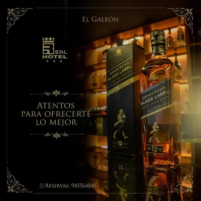 a bottle of alcohol on a shelf in a store at Real Hotel in Huánuco