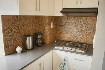 a kitchen with a stove and a counter top at Lindo y moderno Excelente ubicación in Lima
