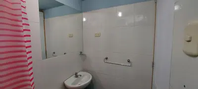 a bathroom with a sink and a toilet at Cozy and fully furnished apartment in Miraflores in Lima