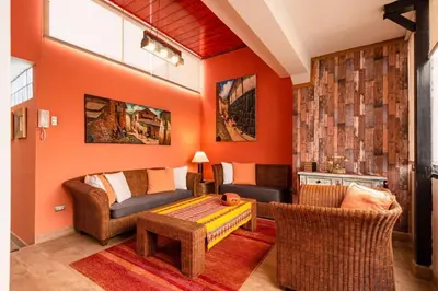 a living room with a couch and a table at luxury Andino Ciudad real & 1 bed in Lima