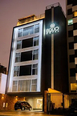 a car parked in front of a building at Equo Hotel Boutique in Lima