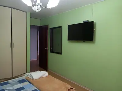 a room with a flat screen tv on the wall at apartamento CAA pardo in Lima