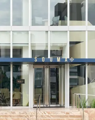 a building with a sign that reads sutton mews at SOUMA Hotel, Vignette Collection by IHG in Lima