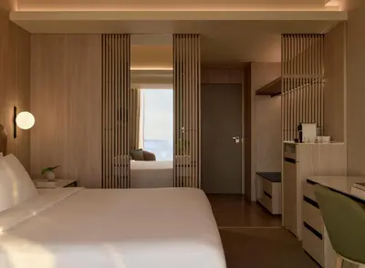 a hotel room with a bed and a bathroom at SOUMA Hotel, Vignette Collection by IHG in Lima
