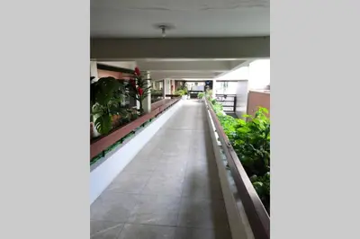 an empty hallway in a building with plants at 6 - Departamento de 2 dormitorios en area turistica de Miraflores in Lima
