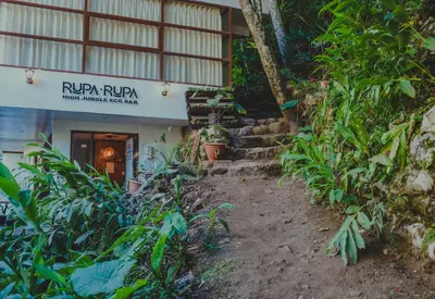 a building with a sign that reads rufiji ruuamit master market hospital at Rupa Rupa High Jungle Eco B&B in Machu Picchu